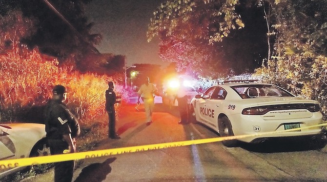 POLICE at the scene of the a shooting in Fleming Street in which four-year-old Kenton Seymour Jr was killed. 
Photo: Austin Fernander