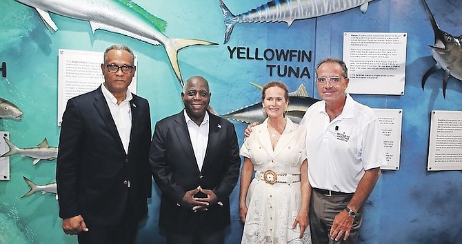 THE BAHAMAS Maritime Museum was officially opened on Saturday, August 6 with a Ribbon Cutting Ceremony held at Port Lucaya Marketplace. Keynote speaker for the event was Prime Minister and Minister of Finance, the Hon. Philip Davis, and giving remarks on behalf of the Minister for Grand Bahama was Minister of Health and Wellness, the Hon. Dr. Michael Darville. Shown from left are: Minister Darville; Prime Minister Davis and Gigi and Carl Allen, owners of Allen Exploration. 
Photo: Andrew Miller/BIS