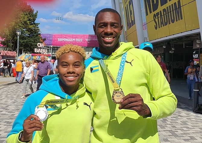 MEDAL GLORY: Devynne Charlton, left, and LaQuan Nairn show off their silver (100 metre hurdles) and gold (long jump) medals respectively won at the 2022 Commonwealth Games in Birmingham, England. After 11 days of intense competition in seven disciplines, Team Bahamas will return from the Commonwealth Games with the two medals and tied in the 23rd spot on the medal chart with Grenada. Members of the team, including executives and athletes, left the games with varied experiences to cherish.