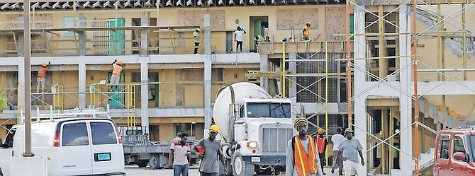 REPAIRS being made to TA Thompson Jr High yesterday. Photos: Austin Fernander