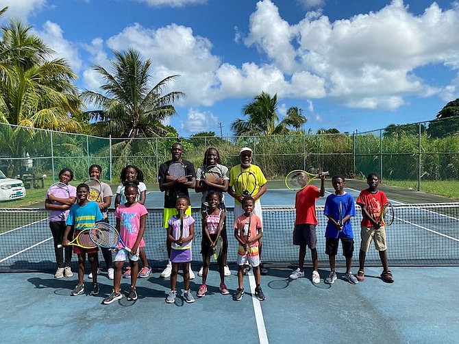 COMMONWEALTH Games long jump gold medallist LaQuan Nairn made a surprise visit to the Percy Munnings Park yesterday where the Corey Francis Community Tennis Summer Camp was held in Sunset Park.