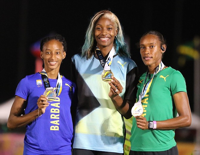 Barbados' Sada Williams, The Bahamas' Shaunae Miller-Uibo and Jamaica's Stephanie-Ann McPherson with their medals. Photos by Vandyke Hepburn