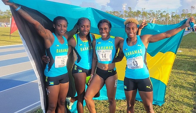 BAHAMAS women’s relay team of, from left to right, Printassia Johnson, Anthonique Strachan, Tynia Gaither and Devynne Charlton.