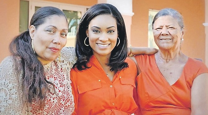 Aisha (centre) with her mother, Shawn, and grandmother, Geneva.