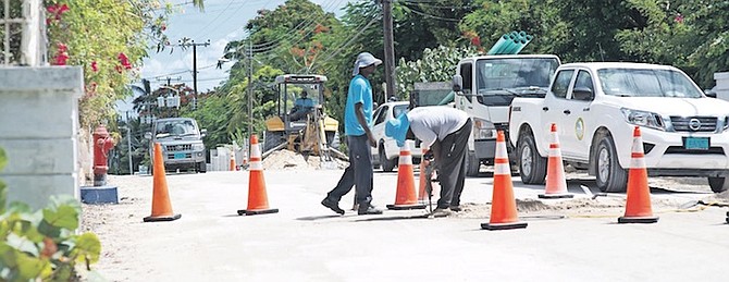 CONSTRUCTION work on Village Road this week. Photos: Moise Amisial