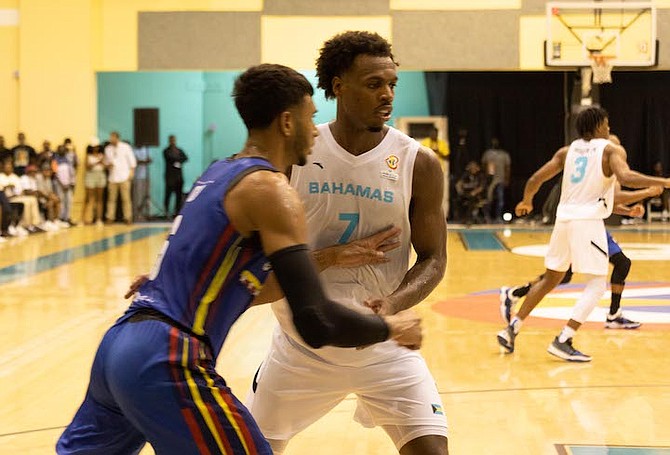 GOOD EFFORT: Chavano “Buddy” Hield (7) in action for The Bahamas last night in their World Cup Americas Region qualifying game against Venezuela at the Kendal Isaacs Gymnasium. The Bahamas lost by five points - 86-81. 
Photo: Moise Amisial/Tribune Staff