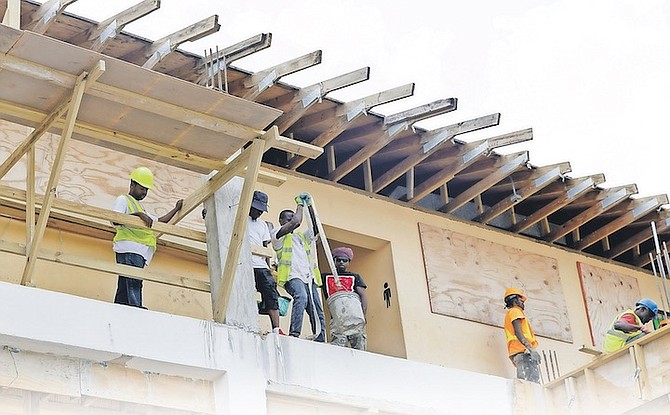 CONSTRUCTION work earlier this summer as schools got ready for the return of students for the new term.