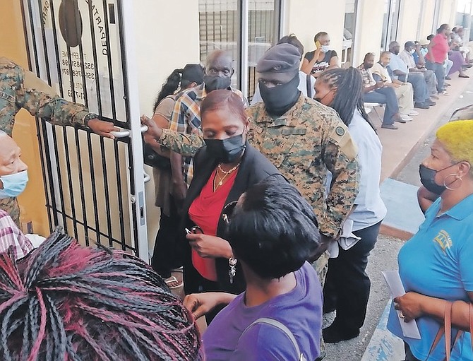 Seniors and disabled people queuing in Freeport for five hours for assistance in Grand Bahama last week. Photo: Denise Maycock/Tribune Staff