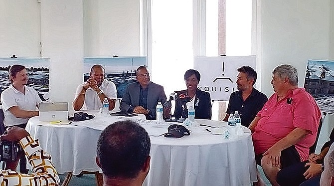 An official announcement of the sale of the Running Mon Marina and Resort in Freeport to Xquisite Yachts was made on Friday. Seen from left to right are Eugene Samarin, Counsel for Xquisite Yachts; Derek Newbold, Chief Investment Officer at GBPA; Ian Rolle, GBPA President; Minister for Grand Bahama Ginger Moxey, Mr Tamas Hamor, CEO of Xquisite Yachts; and David Townsend, CFO. Photo by Denise Maycock
