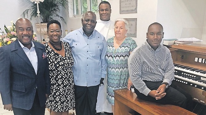 From left, Dr Carlos Thomas, Sophia Watson, Prime Minister Phillip “Brave” Davis, Father Enrique McCartney, assistant rector of St Christopher’s, Donna Harding-Lee, St Christopher’s people’s warden, and Raphe-enne Adderley.