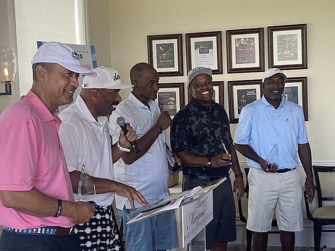 THE WINNERS of the 2022 Steve & Marjorie Harvey Invitational Charity Golf Tournament at the Atlantis - the Georgia Power team - receive their awards.