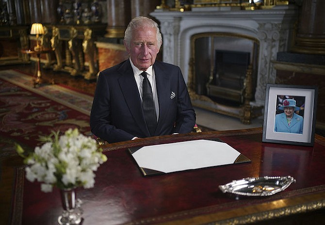 Britain's King Charles III delivers his address to the nation and the Commonwealth from Buckingham Palace, London, Friday, following the death of Queen Elizabeth II on Thursday. (Yui Mok/Pool Photo via AP)