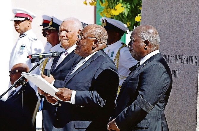Former Prime Minister Hubert Ingraham, flanked by former Prime Minister Perry Christie and Prime Minister Philip “Brave” Davis, read a proclamation in Parliament Square Sunday on behalf of Governor General Sir Cornelius Smith proclaiming King Charles III as the country’s new monarch. Photo: BIS