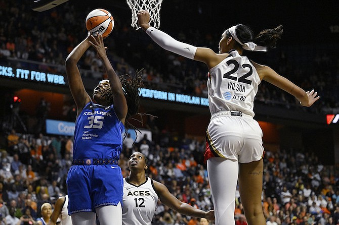 JONQUEL Jones shoots last night.
(AP Photos/Jessica Hill)