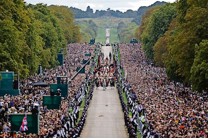 THE HEARSE travels along the Long Walk as it makes its way to Windsor Castle, on the day of the state funeral and burial of Britain’s Queen Elizabeth, in Windsor.
Photo: Carl Recine/AP