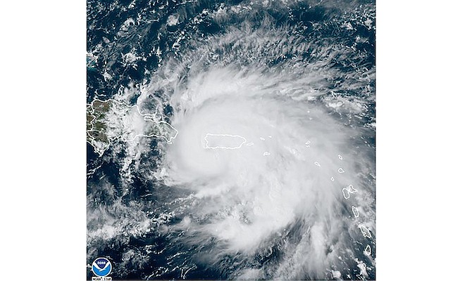 This satellite image provided by NOAA shows Hurricane Fiona in the Caribbean on Sunday. (NOAA via AP)