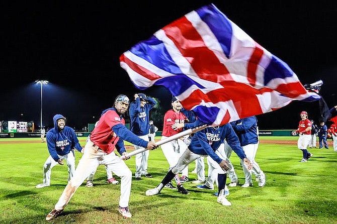 BAHAMIAN players emerged as breakout stars for Team Great Britain en route to the country’s first-ever qualification for the World Baseball Classic. Veteran outfielder Anfernee Seymour led the tournament in several offensive categories while D’Shawn Knowles had one of the team’s best offensive performances in the finale in Regensburg, Germany. Seymour quickly became a fan favourite for his exuberant personality and play-making ability on the basepaths. He led the postgame team celebrations when he raced around the field with the Union Jack and planted the flag pole near home plate. Photo: Great Britain Baseball