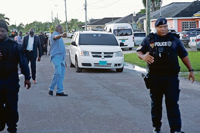 The body is taken from the scene of yesterday’s shooting.
Photo: Moise Amisial