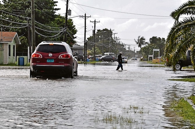 SCENES of flooding in Grand Bahama yesterday. Photo: Vandyke Hepburn