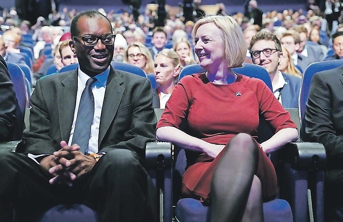 BRITISH Chancellor of the Exchequer Kwasi Kwarteng, left, and British Prime Minister Liz Truss at the Conservative Party annual conference at the International Convention Centre in Birmingham, England, Sunday. 
(Aaron Chown/PA via AP)