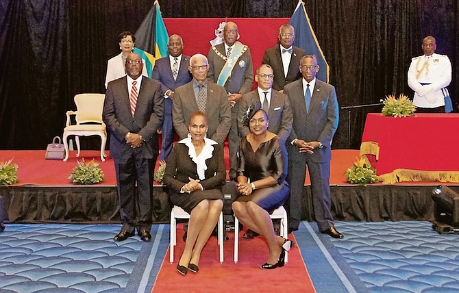 THE NEW group of diplomats appointed yesterday alongside Governor General CA Smith, Prime Minister Philip “Brave” Davis and his wife Ann Marie, and Foreign Affairs Minister Fred Mitchell (back row). Seated are Sharon Wilson, left, the new ambassador to the United Mexican States; and Cheryl Bazard, ambassador extraordinary and plenipotentiary to the Kingdom of Belgium. Second row, from left, Paul Rolle, ambassador to the International Maritime Organisation; Cedric Scott, ambassador to Japan; Anthony Ferguson, ambassador to New Zealand; and V Alfred Gray, High Commissioner to Canada. Photo: Moise Amisial