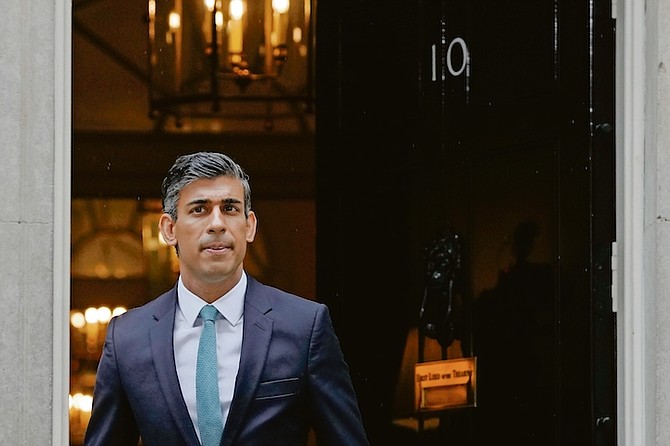BRITAIN’s Prime Minister Rishi Sunak leaves 10 Downing Street for the House of Commons for his first Prime Minister’s Questions in London yesterday. 
Photo: Kirsty Wigglesworth/AP