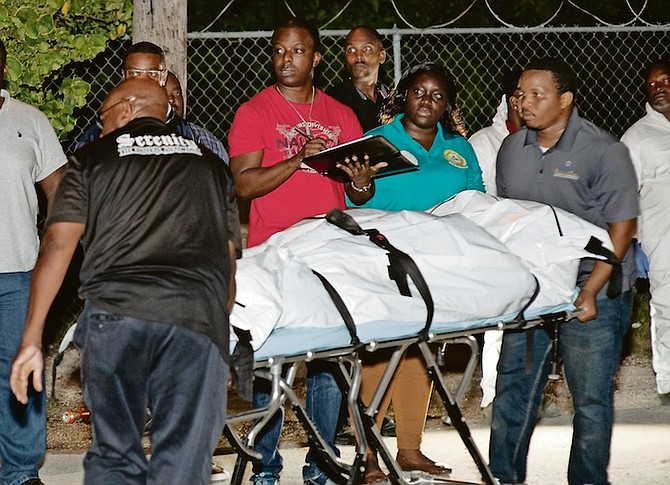 THE SCENE at Lightbourne Alley in the Rock Crusher area last night after four people were shot - leaving a man and a woman dead. Photo: Moise Amisial