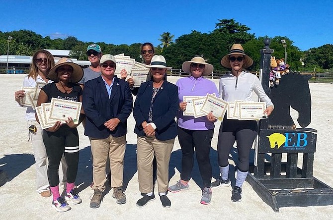 NEWLY certified officials celebrate the successful completion of the CEA 2022 Education Tour. L-R: Cathy Ramsingh-Pierre, D’Yanndria Saunders-Curry, Carrie Saidi, Erika Adderley, Kimberly Johnson and Dr. Amanda Pinder. Clinicians CEA President Heidi Mello and Colleen Hoffman in foreground.