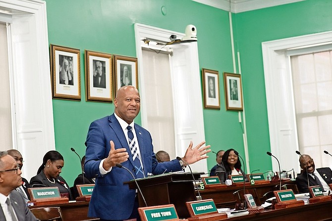 LABOUR and Immigration Minister Keith Bell in Parliament yesterday. Photo: Moise Amisial