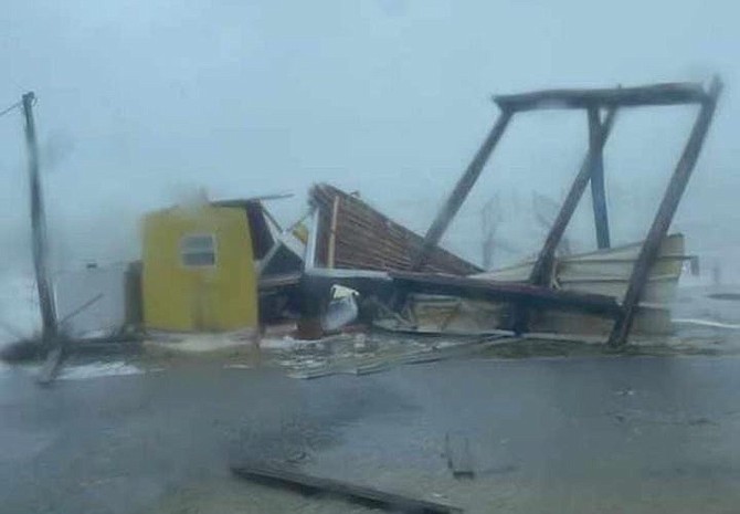 Damage from Tropical Storm Nicole to a gas station building that was recently completed in Cooper's Town, North Abaco.