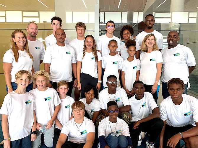 TEAM BAHAMAS READY: Members of the national triathlon team can be seen before their departure at the Lynden Pindling International Airport yesterday morning.