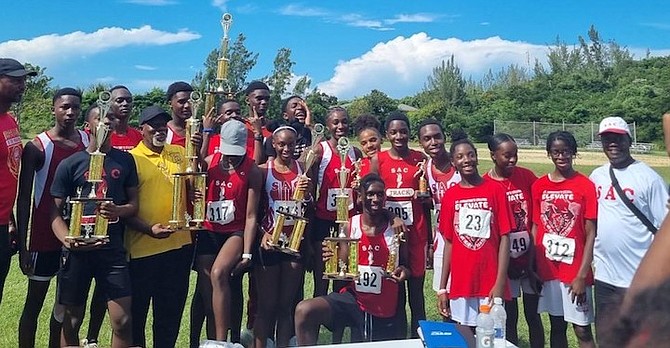 SAC’s Big Red Machine team display their trophies won at the BAISS Cross Country Championships on Saturday. Photos: Taylor Bain