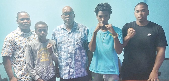 SHOWN, from left to right, are head coach Valentino Knowles, boxer Milton Newbold, federation president Vincent Strachan and boxers Keano Cox and Tyrone Humes before they leave town with the rest of the national team this week.