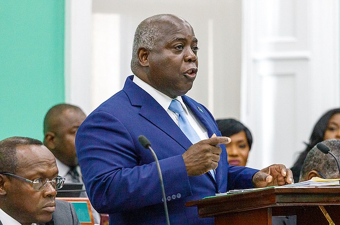 PRIME Minister Philip ‘Brave’ Davis speaking in the House of Assembly yesterday.
Photo: Austin Fernander