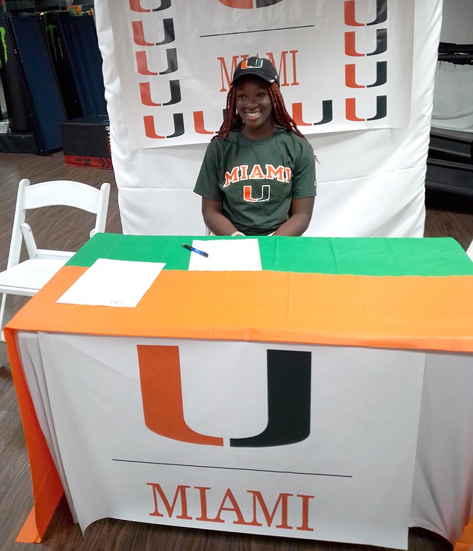 CALEA Jackson signs her letter of intent to take her discus-throwing talent to the University of Miami where she will compete on the Hurricanes women’s track and field team.