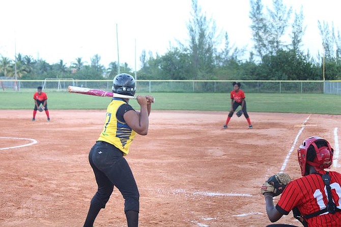 THE LW Young Golden Eagles in action against the HO Nash Lions in junior girls softball action
yesterday. The Lions won 18-2.