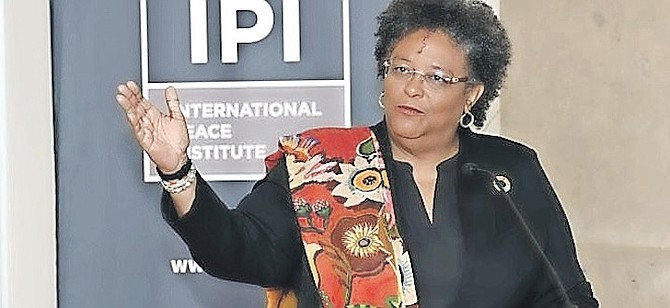 MIA Mottley speaking at the Kofi Annan lecture series.