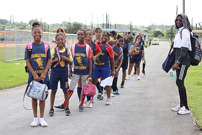 THE PALMDALE Primary Panthers girls, coached by Ashley Oembler (far right), are slated to square off against Garvin Tynes.
Photo: Austin Fernander/Tribune Staff