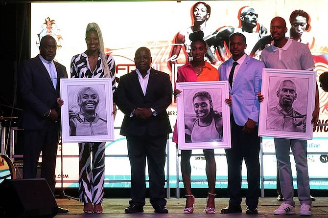 SHOWN, from left to right, are Minister of Youth, Sports and Culture Mario Bowleg, World and Olympic champion Shaunae Miller-Uibo, Prime Minister Philip Davis, sprinter Anthonique Strachan, celebrity artist Jamaal Rolle and World and Olympic champion Steven Gardiner as they became the latest athletes added to the Ministry of Youth, Sports and Culture’s Legends Walk of Fame yesterday. 
Photos by Eric Rose/BIS