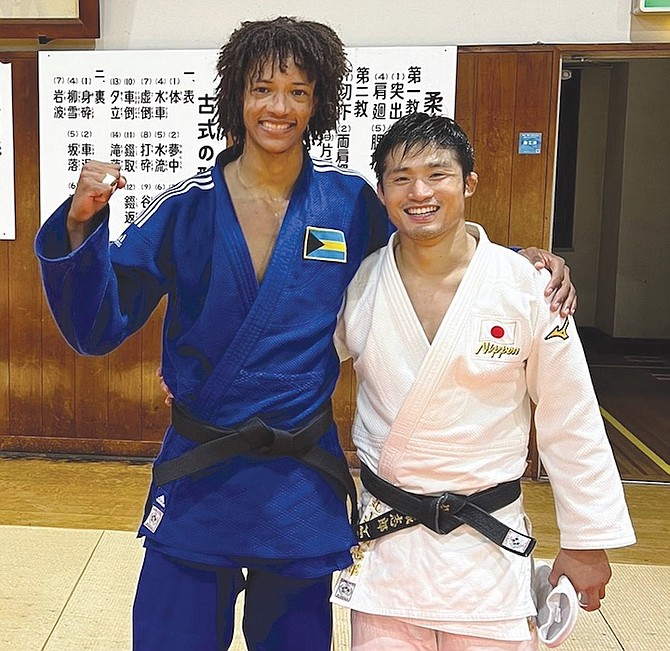 ANDREW MUNNINGS, left, and Maruyama Joshiro, of Japan.