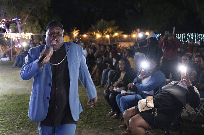 Bishop Lawrence Rolle performs at Mt. Carmel Preparatory Academy in Nassau, Bahamas in December. Rolle's ministry received $50,000 from FTX in early 2022, one of several donations the cryptocurrency exchange made to the Bahamian people when it relocated to the Caribbean island nation in 2021. (AP Photo/Ken Sweet)