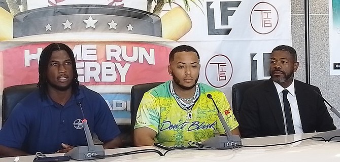 DON’T Blink Home Run Derby co-founders Lucius Fox, far left, and Todd Isaacs Jr and CARIFTA Local Organising Committee CEO Lynden Maycock.