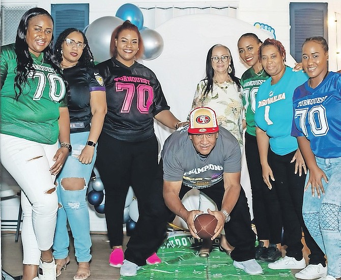 ALL star team - Burket huddles with his sister and his daughters representing “Team Turnquest” for his 70th birthday.