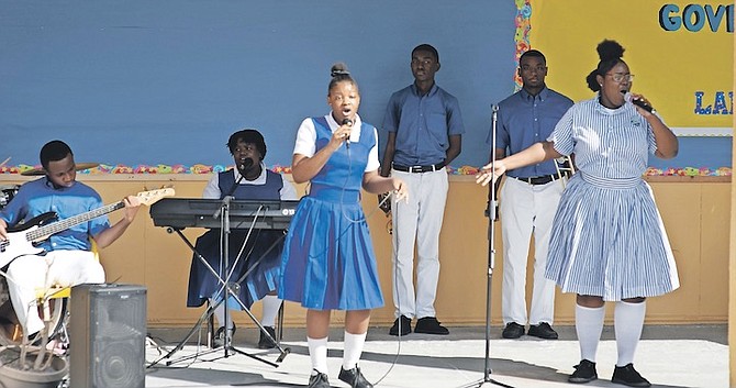 STUDENTS of Government High School entertaining with music and singing yesterday during the launch of the Ministry of Education’s ‘Labour on Campus’ - a series of career/job fairs to assist 11th graders in preparing for the job market. 
Photo: Moise Amisial