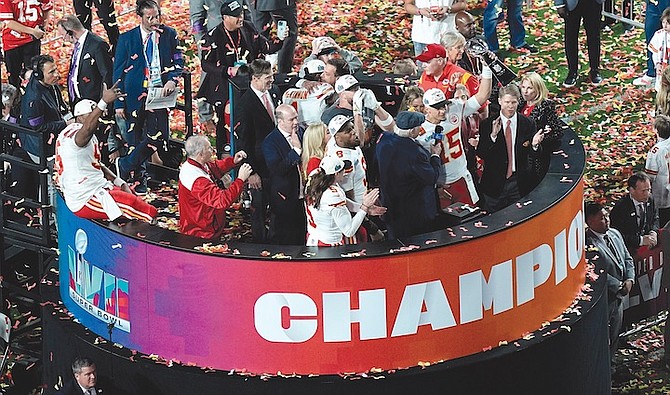 KANSAS City Chiefs quarterback Patrick Mahomes (15) holds the Vince Lombardi Trophy last night after the NFL Super Bowl 57 football game, against the Philadelphia Eagles in Glendale, Arizona.
(AP Photos/David J Phillip)