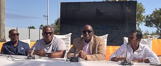 SHOWN, from left to right, are Local Organising Committee CEO Lynden Maycock, Ricardo Williams of Drifters, Lunnon Gibson of Fireworks Unlimited and Dame of the Games Pauline Davis.