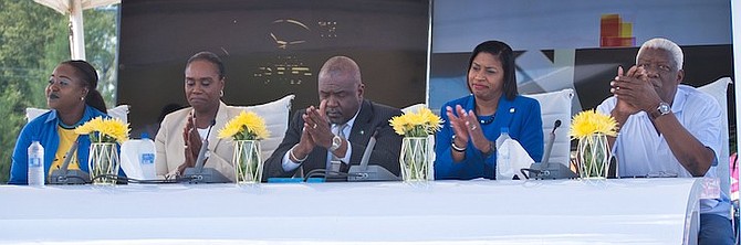 BIANCA ARANHA, Michelle Thompson, Minister Mario Bowleg, Myra Lundy-Mortimer and Mike Sands give applauses during the CARIFTA press conference on Wednesday.
