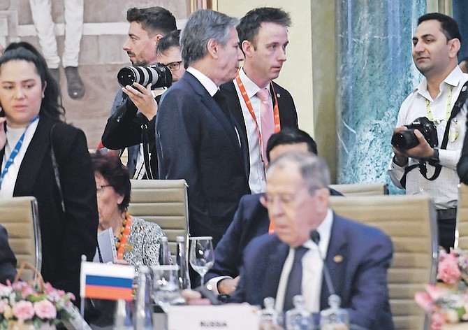 US Secretary of State Antony Blinken, top centre, walks past Russian Foreign Minister Sergey Lavrov during the G20 foreign ministers’ meeting in New Delhi on Thursday. Photo: Olivier Douliery/Pool Photo via AP