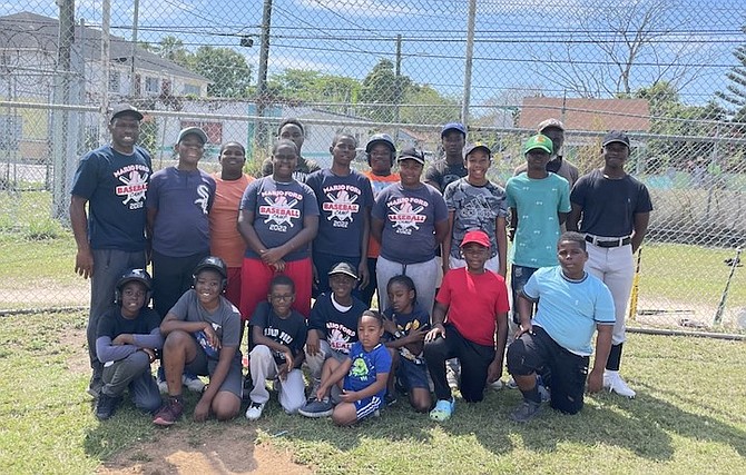 COACH Mario Ford with members of his baseball camp at Windsor Park.