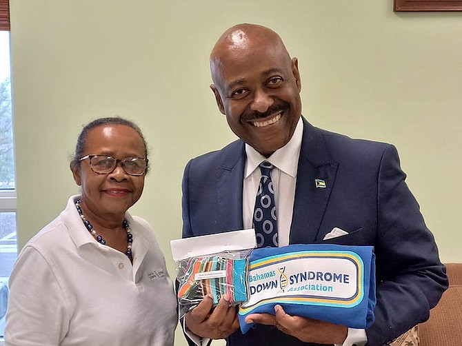 Minister of Social Services and Urban Development Obie Wilchcombe with Ida Poitier Turnquest, vice president of the Bahamas Down Syndrome Association.